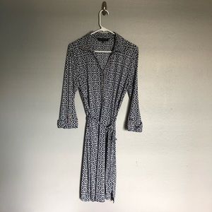 Navy blue and white patterned dress.